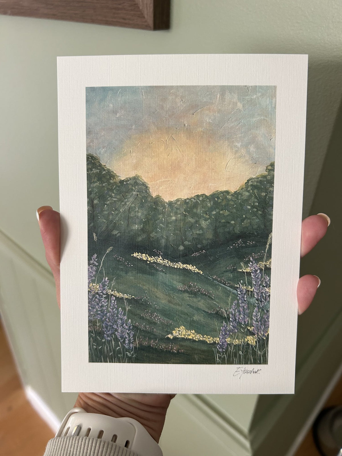 Signed Perspective Piece 5x7 watercolor print of a glowing sky over green hills and purple lupines
